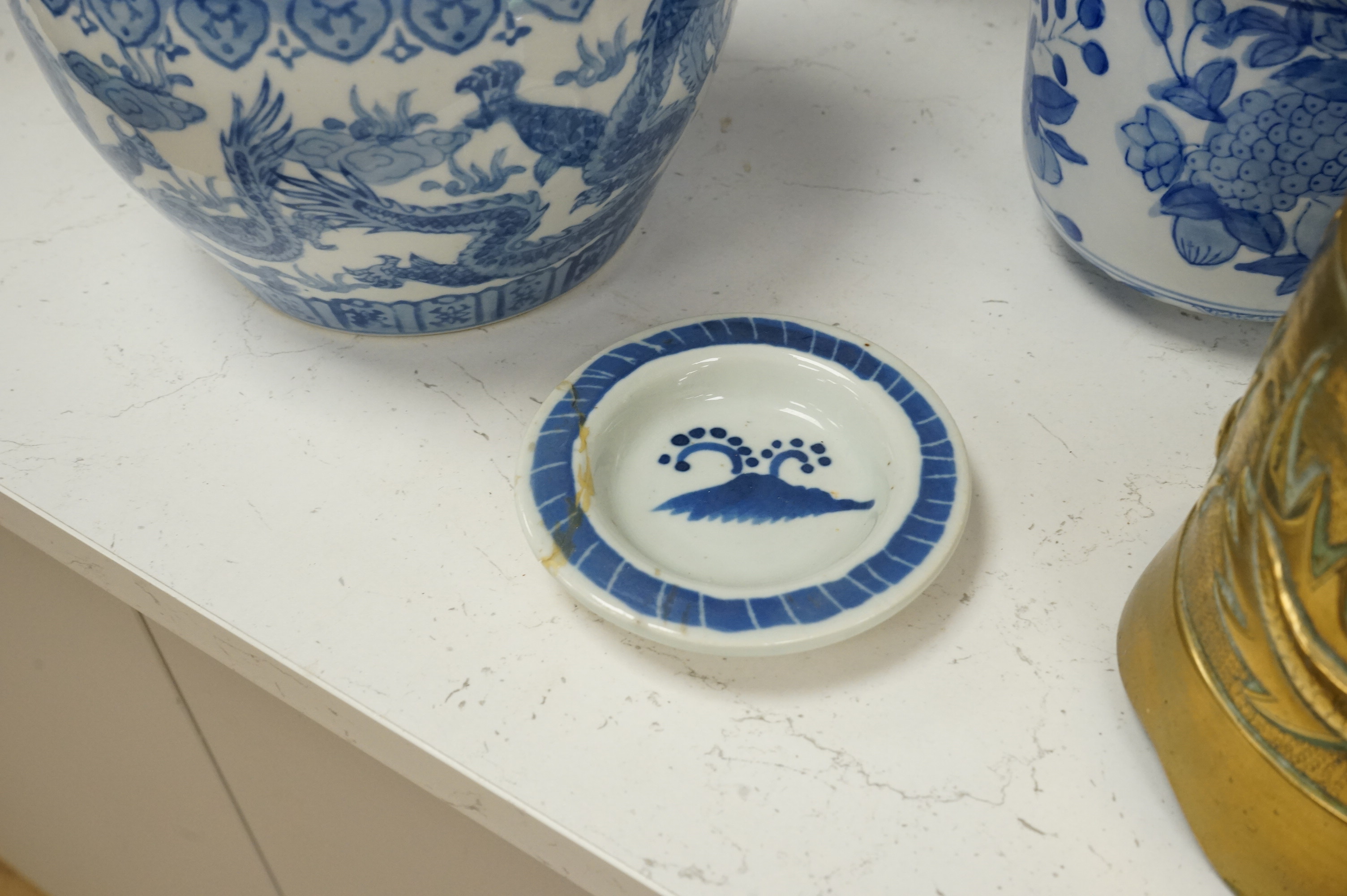 A large collection of various Chinese and Japanese ceramics and collectables to include a 19th century white glazed porcelain figure of Guanyin, largest 30.5cm